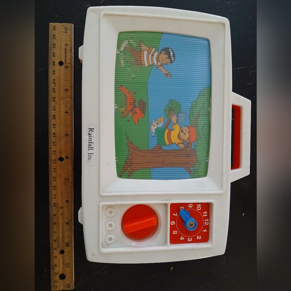 Rainfall Inc Children's Wind Up Toy Music TV Radio Vintage